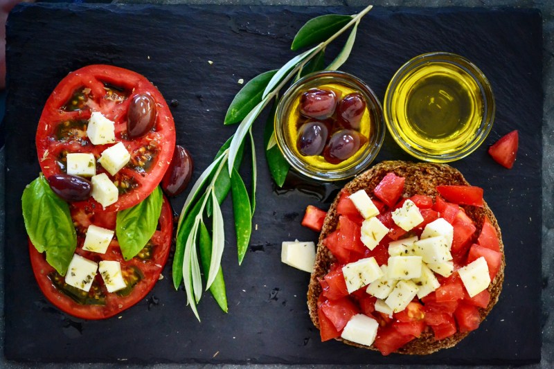 A mouthwatering tomato salad with olive oil.